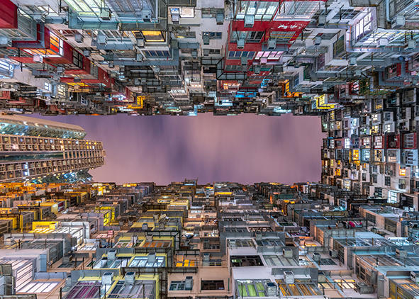 Looking upward at the Yick Cheong Building in Hong Kong (credit: B. Lieu Song, 2019); A typical subdivided flat in Hong Kong (credit: Tyrone Siu/Reuters, 2019). AGATHÓN 10 | 2021